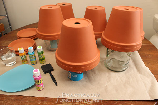 How To Seal Painted Flower Pots - Turn pots upside down on stands to paint all surfaces at once