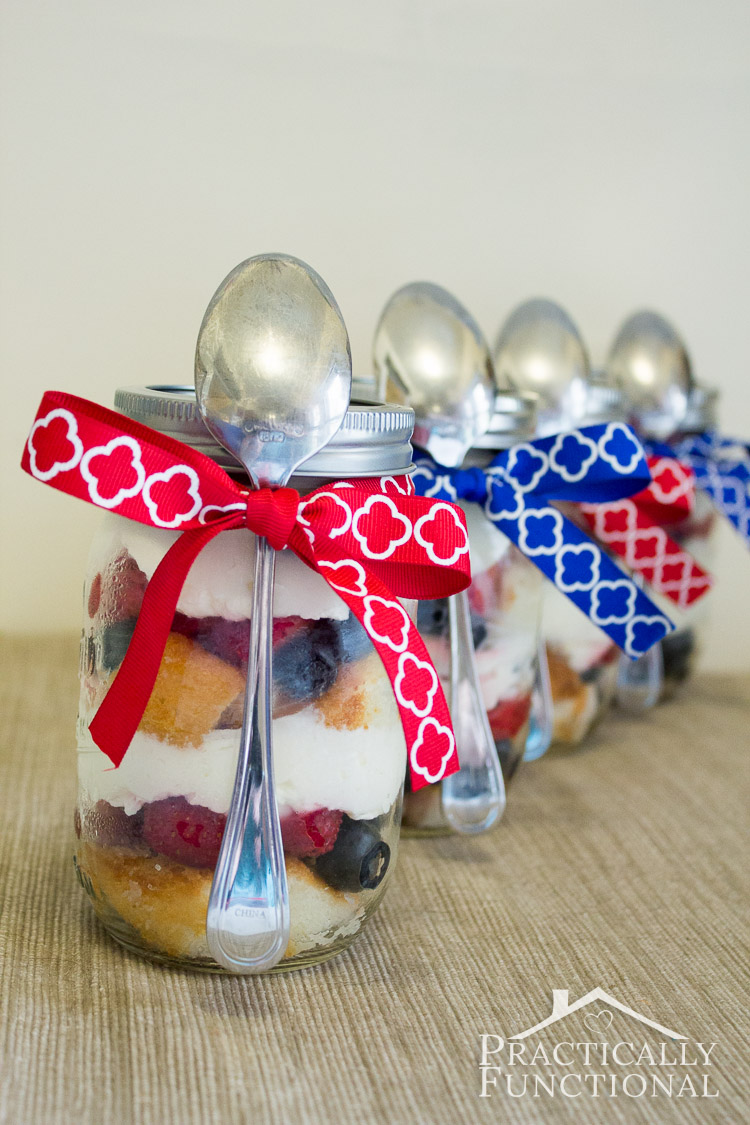 Fourth Of July picnic dessert: Strawberry blueberry trifle! Serve trifle in mason jars to get easy individual servings. Just tie a spoon to the jar with a ribbon, and serve!