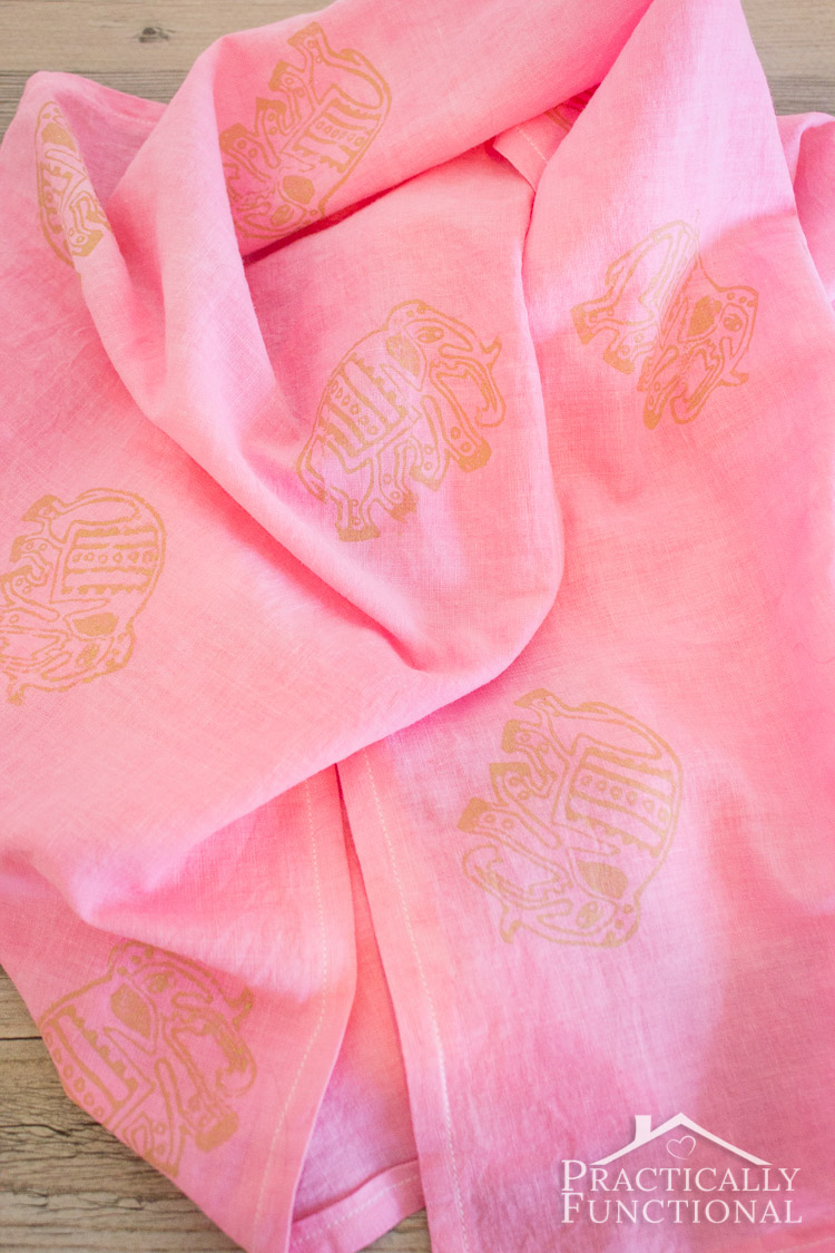 Make your own lightweight pink and gold elephant scarf with Rit dye, fabric ink, and stamps!
