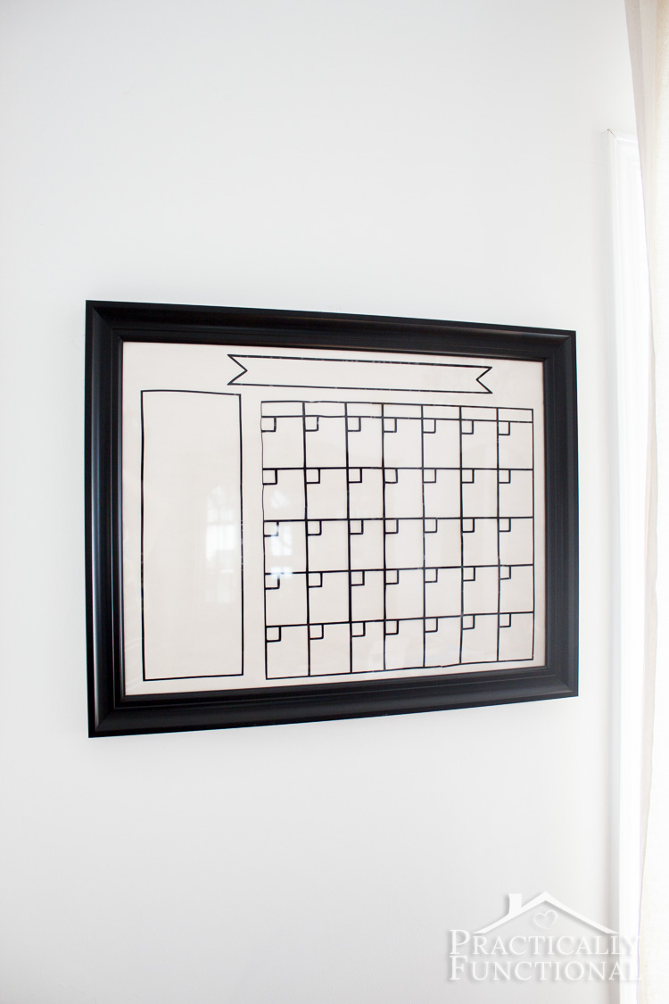 Make your own dry erase calendar with a glass picture frame and black adhesive vinyl!