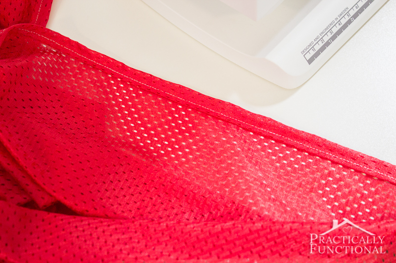 Sew up the edges of the athletic fabric to keep your DIY water ring sling from fraying