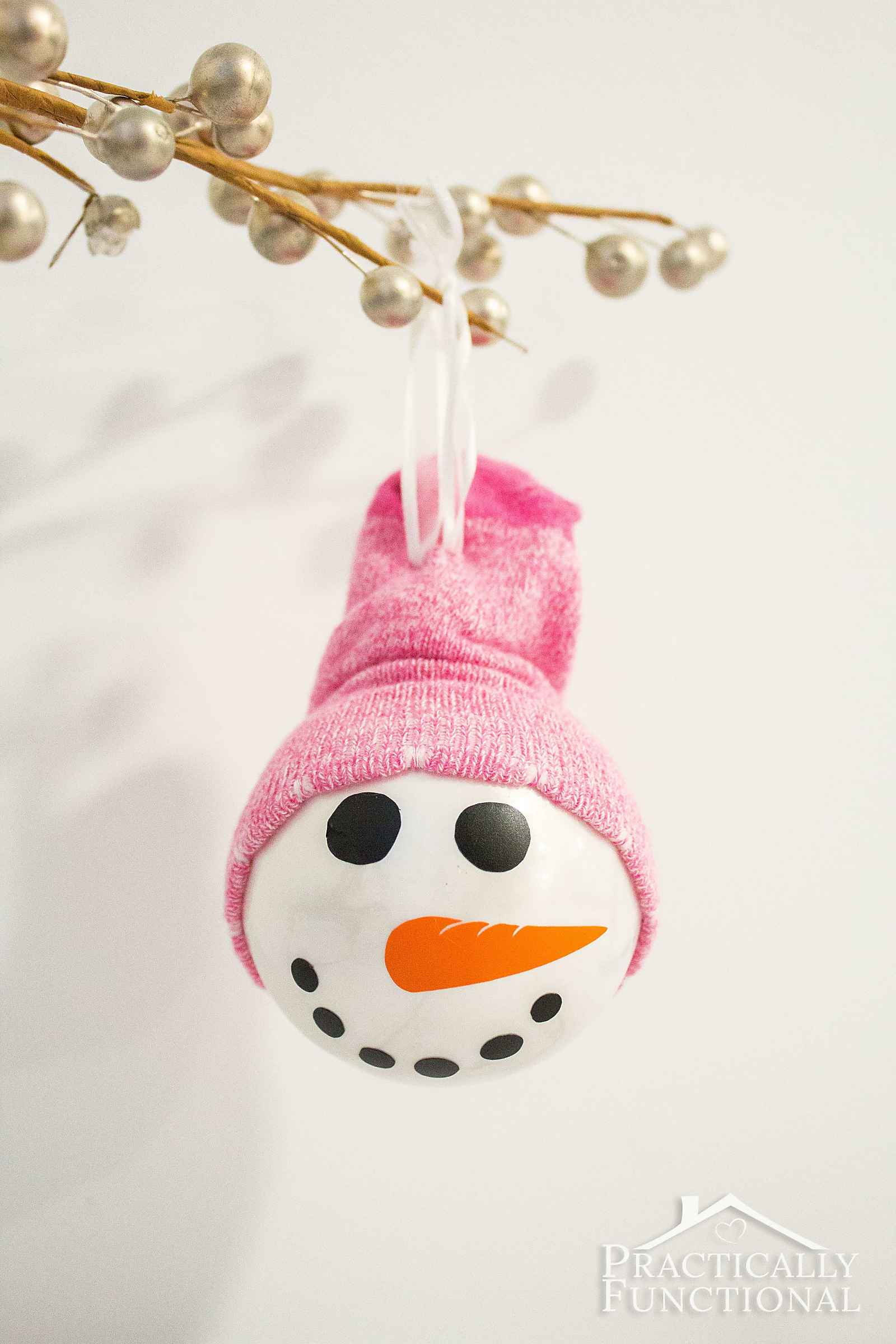 Got a sock that's missing it's pair? Make a cute DIY snowman ornament with it!