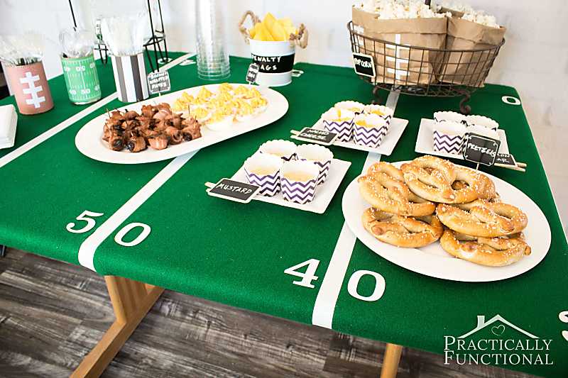Make a DIY football field tablecloth using green felt and white duct tape! Perfect for a football party!